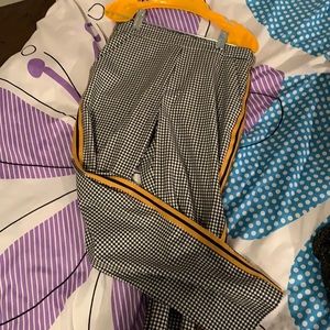 Ankle black and white pants with orange stripe